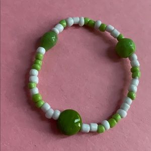 green/white bracelet